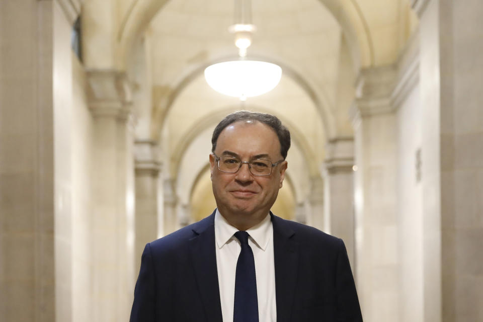 The new Bank of England Governor Andrew Bailey poses for a photograph on the first day of his new role at the central bank in London, Monday March 16, 2020. Andrew Bailey is replacing Mark Carney. (Tolga Akmen/Pool via AP)
