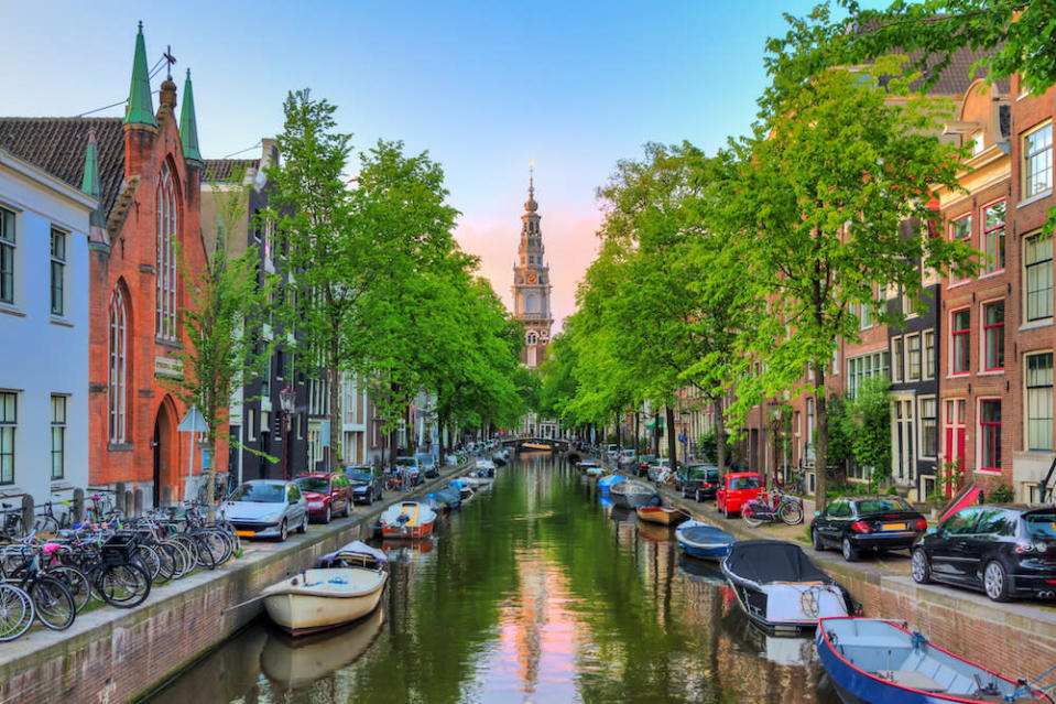 <div><p>"Amsterdam is a city made for kids. Great museums (especially the <a href="https://go.redirectingat.com?id=74679X1524629&sref=https%3A%2F%2Fwww.buzzfeed.com%2Flaurafrustaci%2Ffamily-vacation-ideas&url=https%3A%2F%2Fwww.tripadvisor.com%2FAttraction_Review-g188590-d194316-Reviews-Het_Scheepvaartmuseum_The_National_Maritime_Museum-Amsterdam_North_Holland_Provinc.html&xcust=6269937%7CBF-VERIZON&xs=1" rel="nofollow noopener" target="_blank" data-ylk="slk:National Maritime Museum" class="link ">National Maritime Museum</a>), easy to get around, locals are kid-friendly, food is good, English is widely spoken, and a lovely countryside outside of the city waiting to be explored." </p><p>—<a href="https://www.buzzfeed.com/b47259a7e0" rel="nofollow noopener" target="_blank" data-ylk="slk:b47259a7e0" class="link ">b47259a7e0</a></p><p>You can also find greenery in the middle of the city at the <a href="https://go.redirectingat.com?id=74679X1524629&sref=https%3A%2F%2Fwww.buzzfeed.com%2Flaurafrustaci%2Ffamily-vacation-ideas&url=https%3A%2F%2Fwww.tripadvisor.com%2FAttraction_Review-g188590-d189384-Reviews-Vondelpark-Amsterdam_North_Holland_Province.html&xcust=6269937%7CBF-VERIZON&xs=1" rel="nofollow noopener" target="_blank" data-ylk="slk:Vondelpark" class="link ">Vondelpark</a>, explore on bikes (you can even rent a <i>bakfiet</i>, a bicycle with a box at the front where kids can sit), visit the <a href="https://go.redirectingat.com?id=74679X1524629&sref=https%3A%2F%2Fwww.buzzfeed.com%2Flaurafrustaci%2Ffamily-vacation-ideas&url=https%3A%2F%2Fwww.tripadvisor.com%2FAttraction_Review-g188590-d244497-Reviews-ARTIS_Amsterdam_Royal_Zoo-Amsterdam_North_Holland_Province.html&xcust=6269937%7CBF-VERIZON&xs=1" rel="nofollow noopener" target="_blank" data-ylk="slk:Amsterdam Royal Zoo" class="link ">Amsterdam Royal Zoo</a>, or — for slightly older kids — visit the <a href="https://go.redirectingat.com?id=74679X1524629&sref=https%3A%2F%2Fwww.buzzfeed.com%2Flaurafrustaci%2Ffamily-vacation-ideas&url=https%3A%2F%2Fwww.tripadvisor.com%2FAttraction_Review-g188590-d190555-Reviews-Anne_Frank_House-Amsterdam_North_Holland_Province.html&xcust=6269937%7CBF-VERIZON&xs=1" rel="nofollow noopener" target="_blank" data-ylk="slk:Anne Frank House" class="link ">Anne Frank House</a>.</p></div><span> Dennisvdw / Getty Images</span>