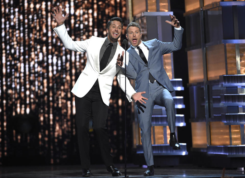 Hosts Luke Bryan, left, and Dierks Bentley present a performance by Florida Georgia Line and Backstreet Boys at the 52nd annual Academy of Country Music Awards at the T-Mobile Arena on Sunday, April 2, 2017, in Las Vegas. (Photo by Chris Pizzello/Invision/AP)