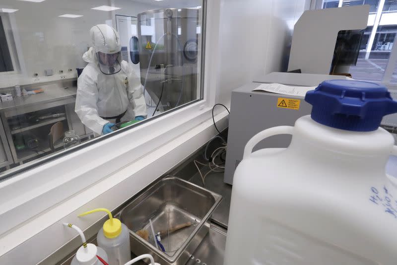 Jerome Bodart, PhD student at the Greenmat laboratory of the University of Liege is seen during a demonstration for the media amid the coronavirus disease (COVID-19) outbreak in Liege