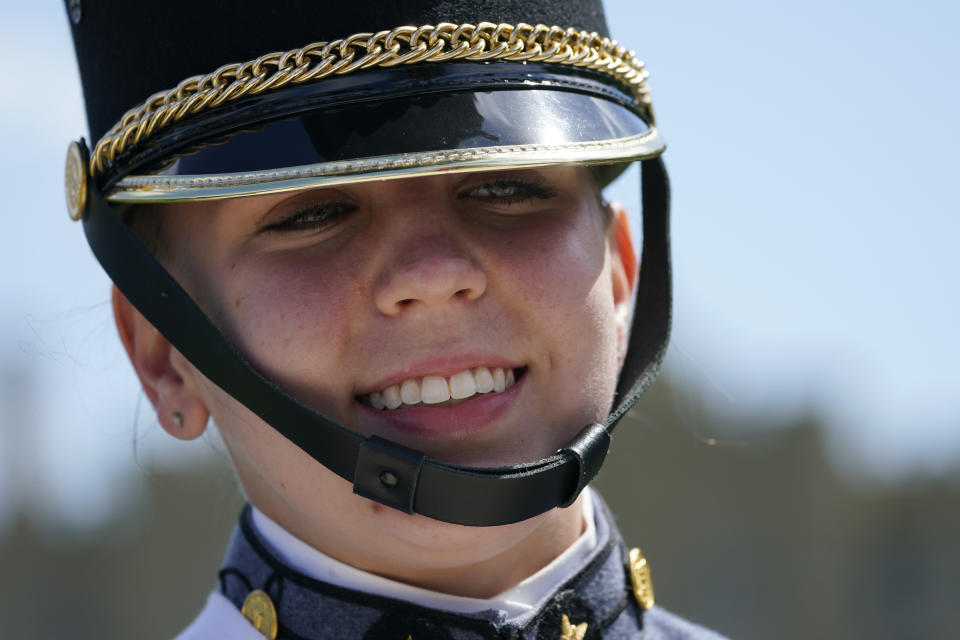 Virginia Military Institute new Corps of Cadet Commander Kasey Meredith, of Johnstown, Pa., smiles after a change of command parade and ceremony on the parade grounds at the school in Lexington, Va., Friday, May 14, 2021. Meredith will be the first female to lead the Virginia Military Institute's Corps of Cadets in its 182 year history. (AP Photo/Steve Helber)