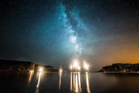 January 17: Milky Way above boats in Lulworth Cove by <a href="http://www.flickr.com/photos/23048898@N06/11706989744" rel="nofollow noopener" target="_blank" data-ylk="slk:DorsetScouser;elm:context_link;itc:0;sec:content-canvas" class="link ">DorsetScouser</a>. Taken at the height of summer at Lulworth Cove in Dorset. There were a fair few boats in the cove with a good group of them in the middle of the water. I lined up the Milky Way with them and took this shot.