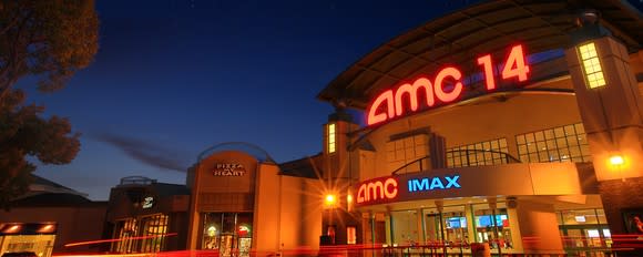 The exterior of AMC 14 theater at Saratoga at night.