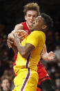 Minnesota forward Charlie Daniels (front) competes with Rutgers forward Dean Reiber for a rebound that ends as a jump ball in the second half of an NCAA college basketball game Saturday, Jan. 22, 2022, in Minneapolis. Minnesota won 68-65. (AP Photo/Bruce Kluckhohn)