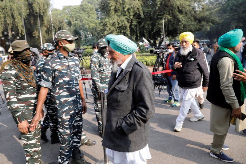 Farmer leaders arrive to attend a meeting with government representatives in New Delhi