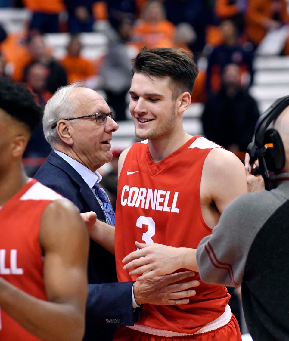 Jim Boeheim and his oldest son, Jimmy, attended Bills practice Monday.