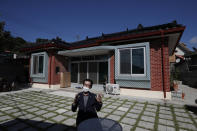 A local resident Shin Dae-sik, 83, speaks during an interview at his home in Cheongju, South Korea, Friday, Sept. 25, 2020. The coronavirus is forcing South Koreans to celebrate their Thanksgiving holiday differently this year, that begin Wednesday, Sept. 30, 2020. Shin said about 15 family members assembled for Chuseok in past years but they decided not to do so this week. (AP Photo/Lee Jin-man)