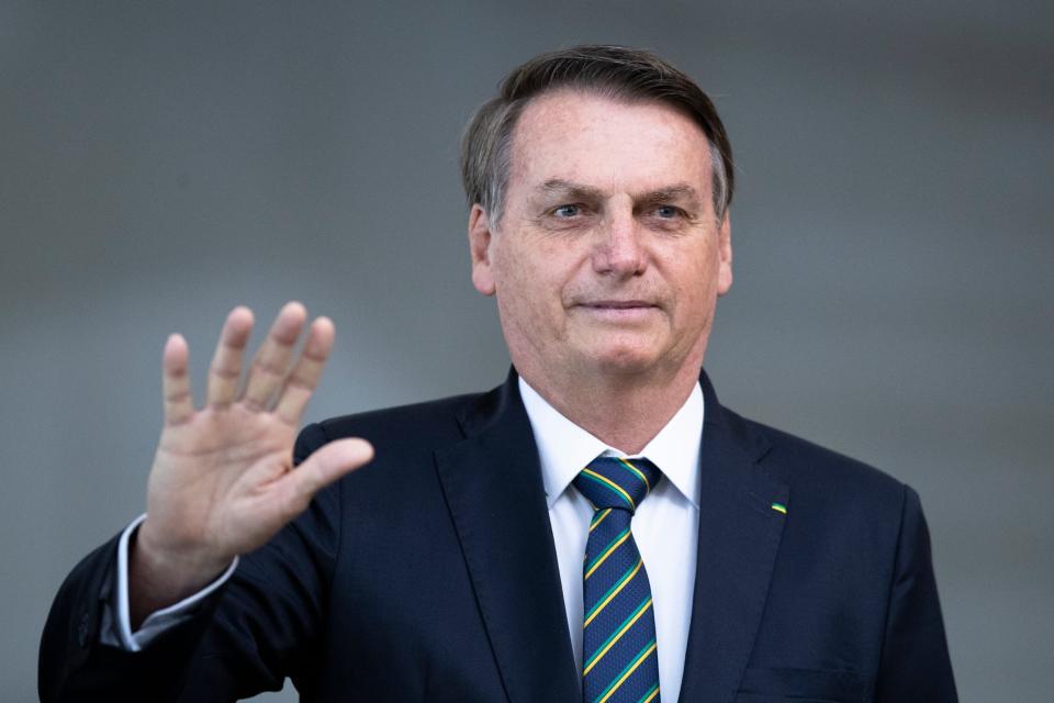 President Bolsonaro has been criticised for his handling of the Amazon (AP)