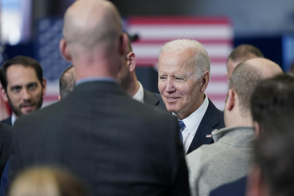 President Joe Biden talks to people in the crowd after speaking about his infrastructure agenda at the New Hampshire Port Authority in Portsmouth, N.H., Tuesday, April 19, 2022. (AP Photo/Patrick Semansky)