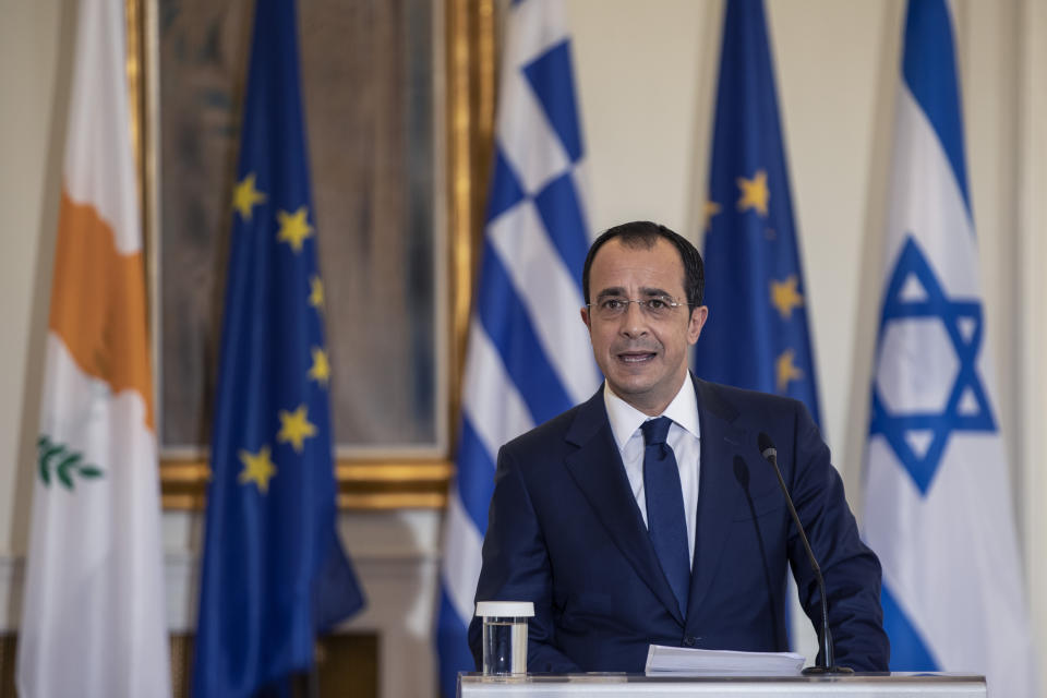 Cypriot Foreign Minister Nikos Christodoulides speaks during a join news conference with his Greek counterpart Nikos Dendias,and Israel's Foreign Minister Gabi Ashkenazi, after a meeting between the foreign Ministers of Greece , Israel and Cyprus in Athens, on Tuesday, Oct. 27, 2020. (AP Photo/Petros Giannakouris)