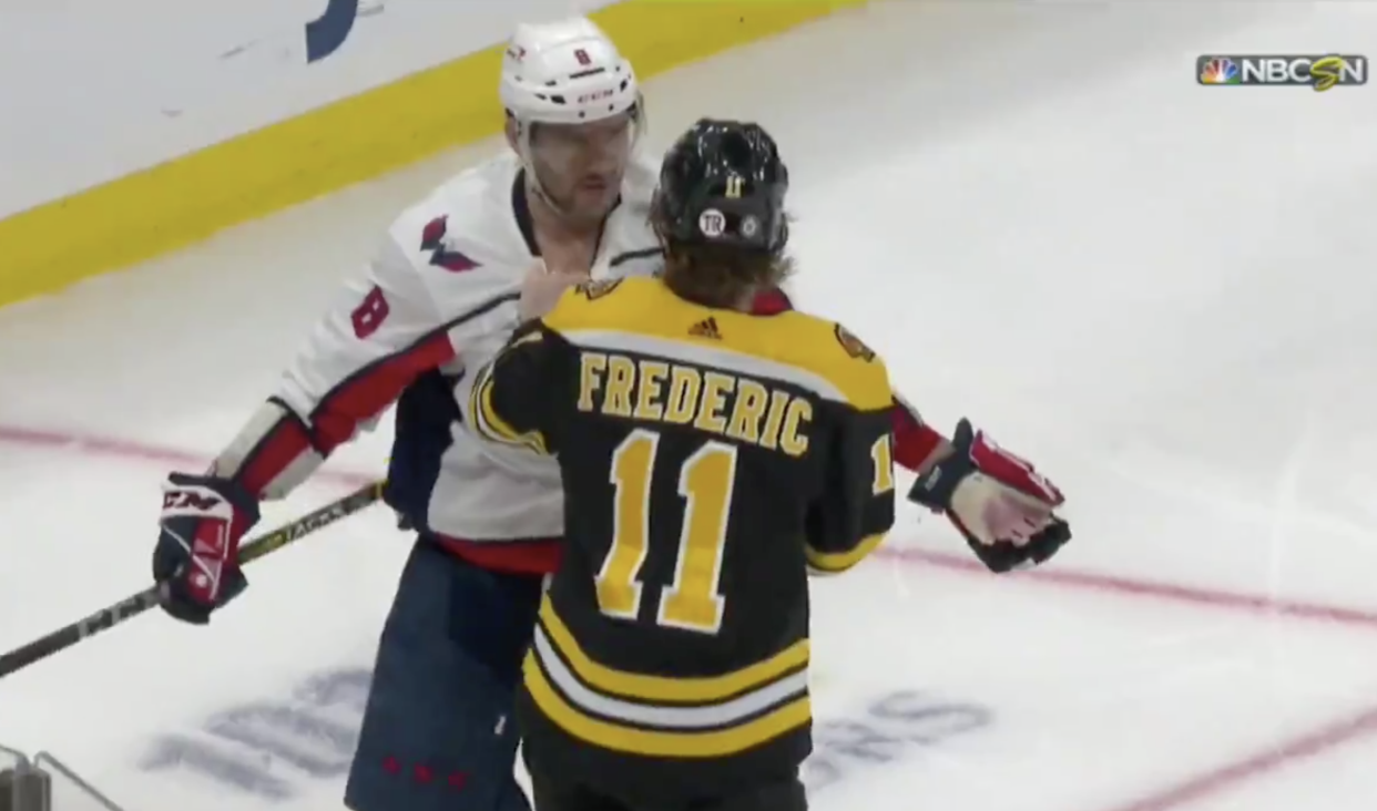 Alex Ovechkin and Trent Frederic had quite a battle going during Wednesday's Bruins-Capitals clash. (Getty) 