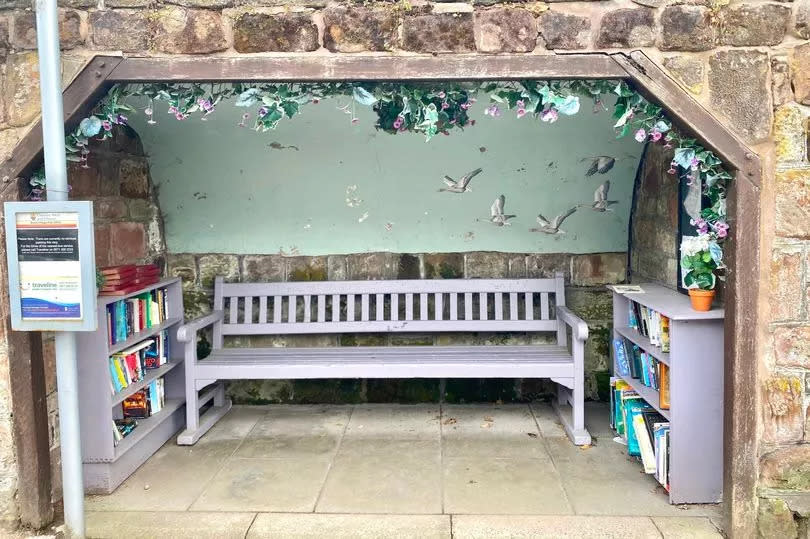 The bus stop which is now a pretty library -Credit:MEN