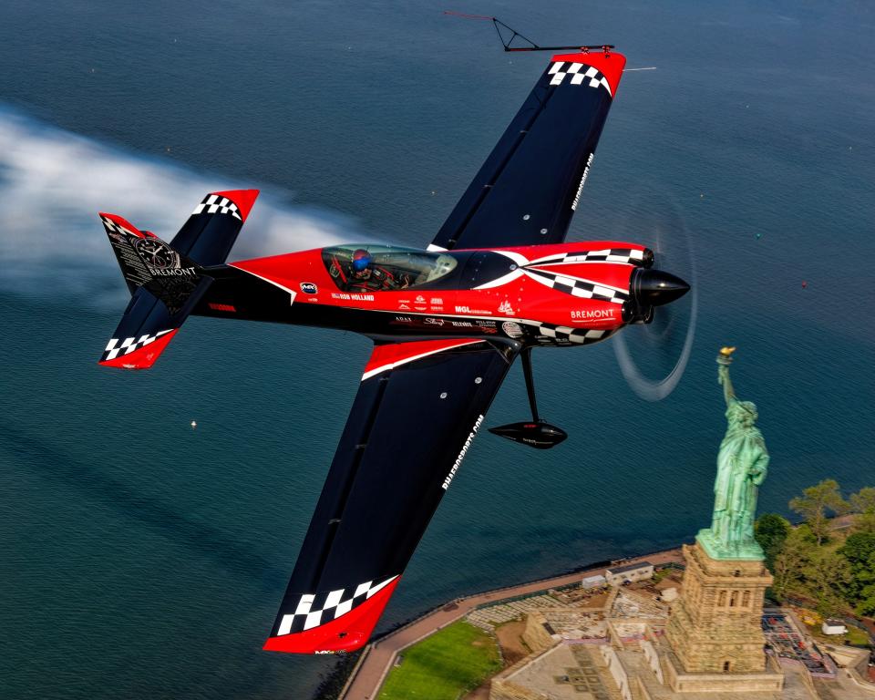 Aerobatics pilot Rob Holland, seen flying over New York City, will travel the New Hampshire Seacoast this weekend to fly in the 2023 Thunder Over New Hampshire Air Show at Pease Air National Guard Base in Portsmouth and the Hampton Beach Seafood Festival.