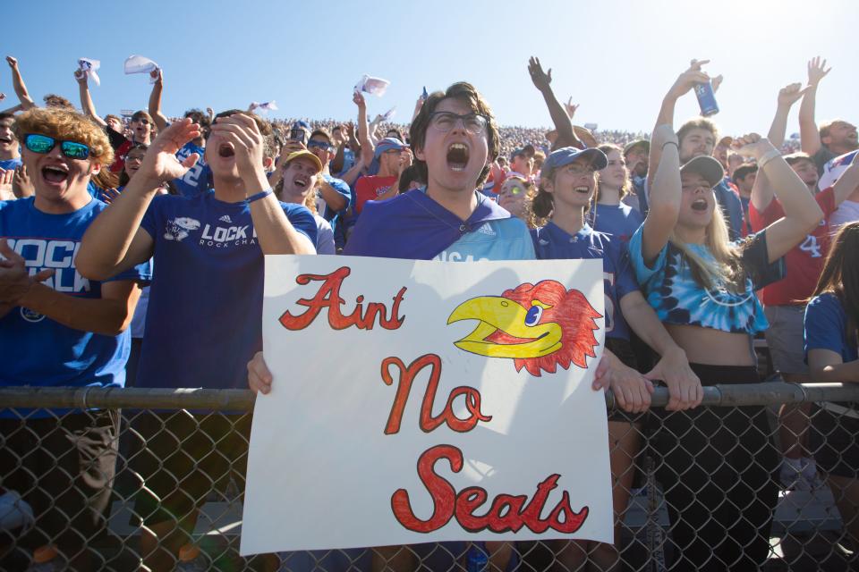 Kansas Jayhawk fans embrace their sold-out seats inside David Booth Kansas Memorial Stadium for Satuday's game against Duke.
