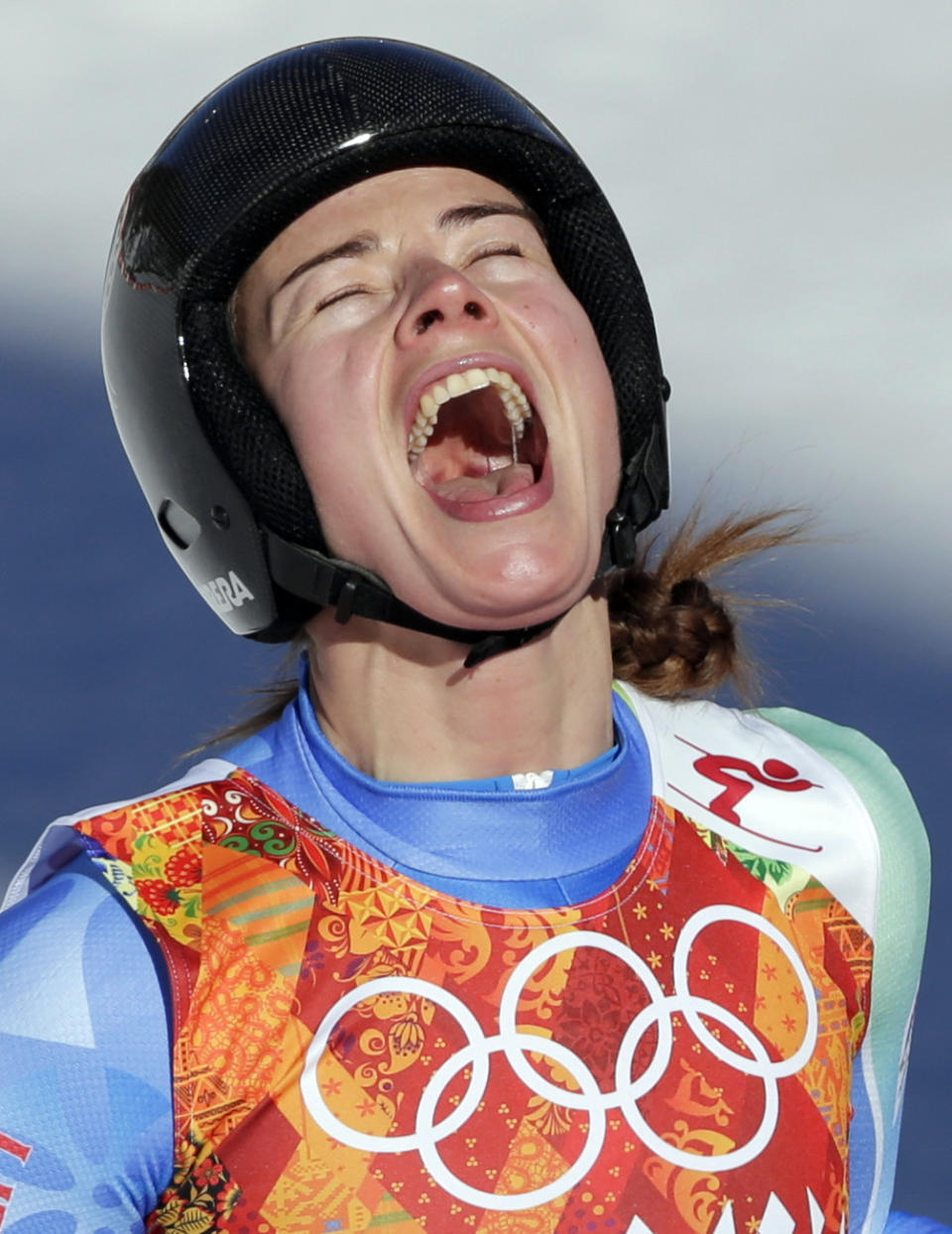 Slovenia's Tina Maze celebrates after finishing in the women's downhill at the Sochi 2014 Winter Olympics, Wednesday, Feb. 12, 2014, in Krasnaya Polyana, Russia. (AP Photo/Gero Breloer, File)