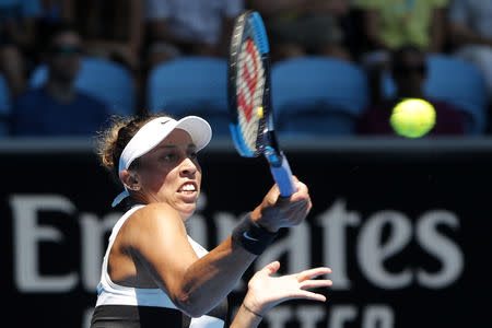 Tennis - Australian Open - Fourth Round - Melbourne Park, Melbourne, Australia, January 21, 2019. Madison Keys of the U.S. in action with Ukraine's Elina Svitolina. REUTERS/Adnan Abidi