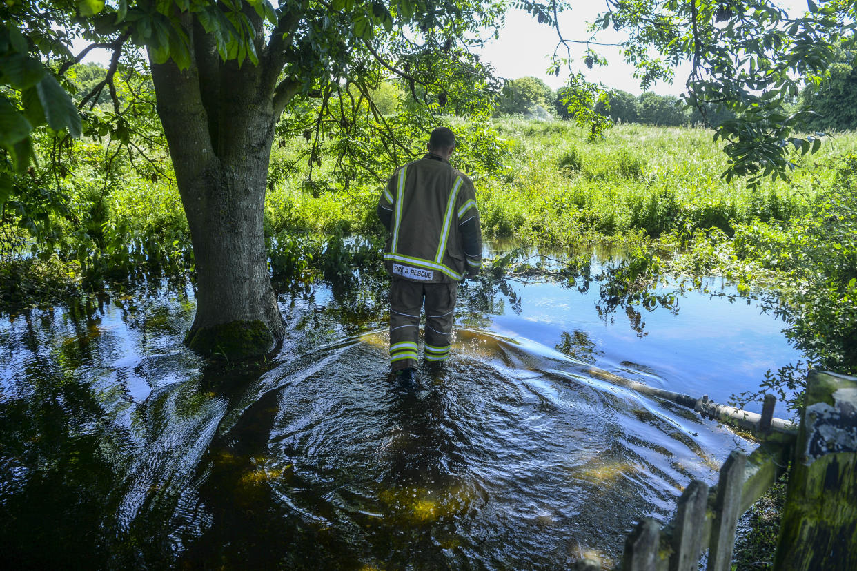 The Lincolnshire fire service battling to pump water away from homes in Wainfleet