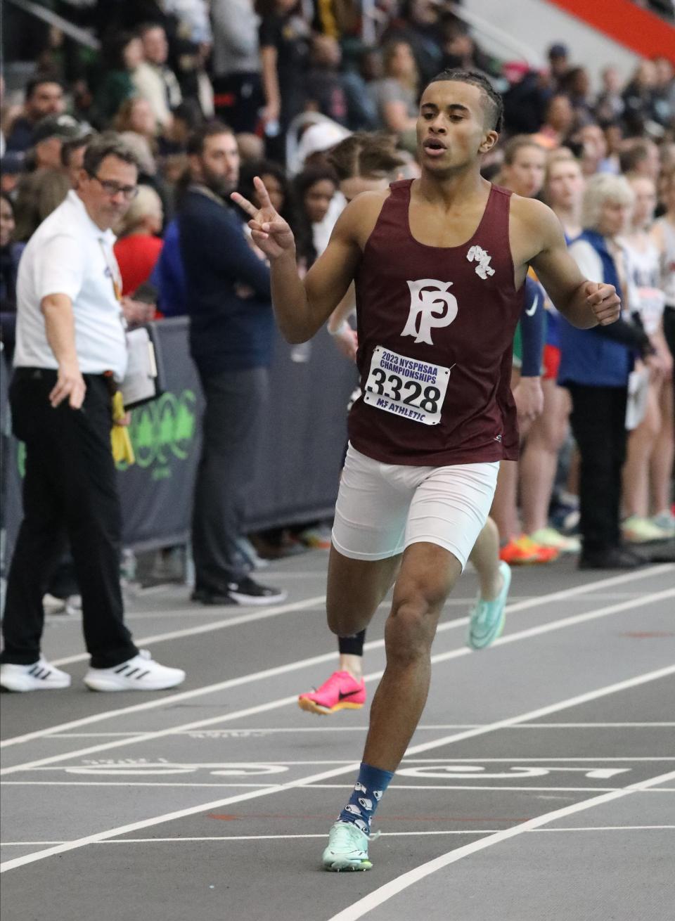 Jaylin Santiago from Fordham Prep competes in the boys 300 meter dash during the New York State Indoor Track and Field Championships, at the Ocean Breeze Athletic Complex on Staten Island, March 4, 2023. 