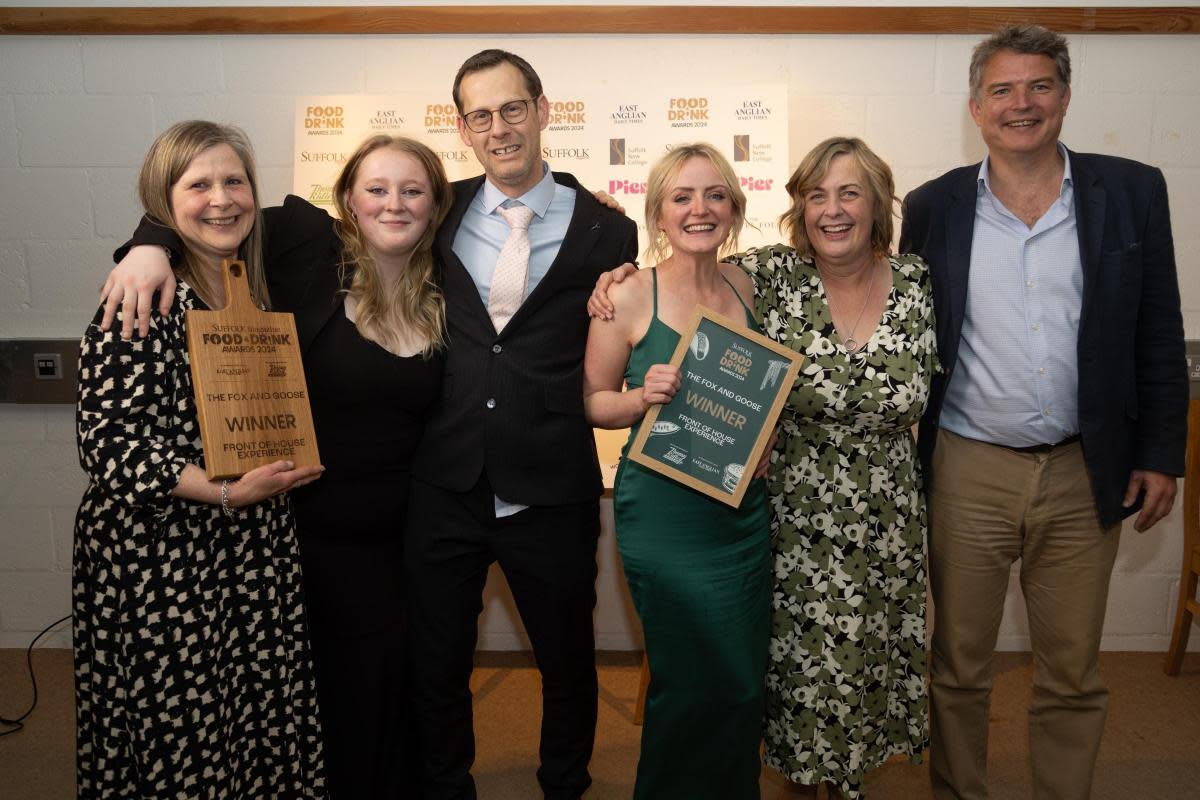 Left to right, Liz Oliver, Gabby Pearce, Paul Yaxley, Rosie Mack and Karen Platt of The Fox and Goose, winner of the Front of House Experience award, with Paddy Bishopp (ambassador judge) <i>(Image: Matthew Potter Photographer and Videographer)</i>