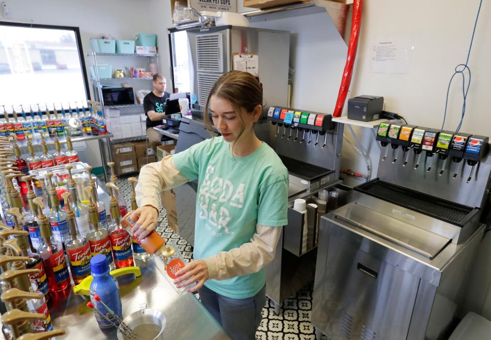 Megan Shumway makes a Caramel Apple drink at the Soda Bar Tuesday, January 23, 2024, in Appleton, Wisconsin. The Caramel Apple is the featured drink at the Soda Bar during Feast Around the Fox Cities.
Dan Powers/USA TODAY NETWORK-Wisconsin.