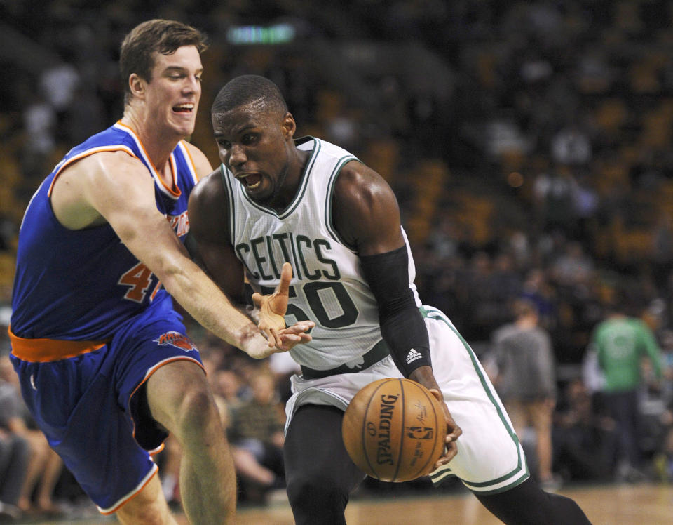 Oct 19, 2016; Boston, MA, USA; Boston Celtics forward Ben Bentil (50) drives to the basket as <a class="link " href="https://sports.yahoo.com/nba/teams/new-york/" data-i13n="sec:content-canvas;subsec:anchor_text;elm:context_link" data-ylk="slk:New York Knicks;sec:content-canvas;subsec:anchor_text;elm:context_link;itc:0">New York Knicks</a> center Marshall Plumlee (40) defends during the second half at TD Garden. Bob DeChiara-USA TODAY Sports