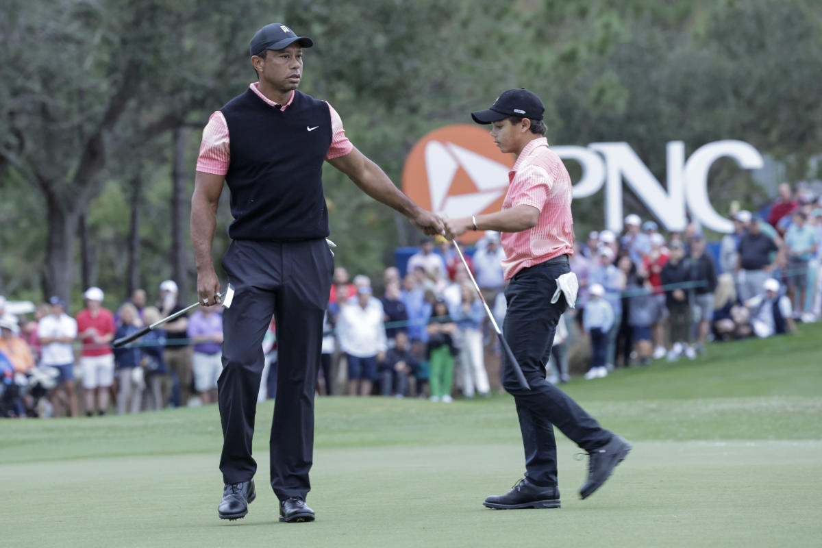 Kuchar and son build 3-shot lead. Tiger Woods and son have to settle for a  nice family affair