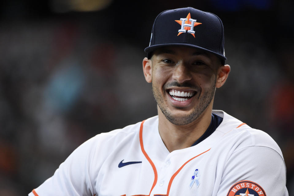 Houston Astros shortstop Carlos Correa smiles before a baseball game against the Chicago White Sox, Sunday, June 20, 2021, in Houston. (AP Photo/Eric Christian Smith)