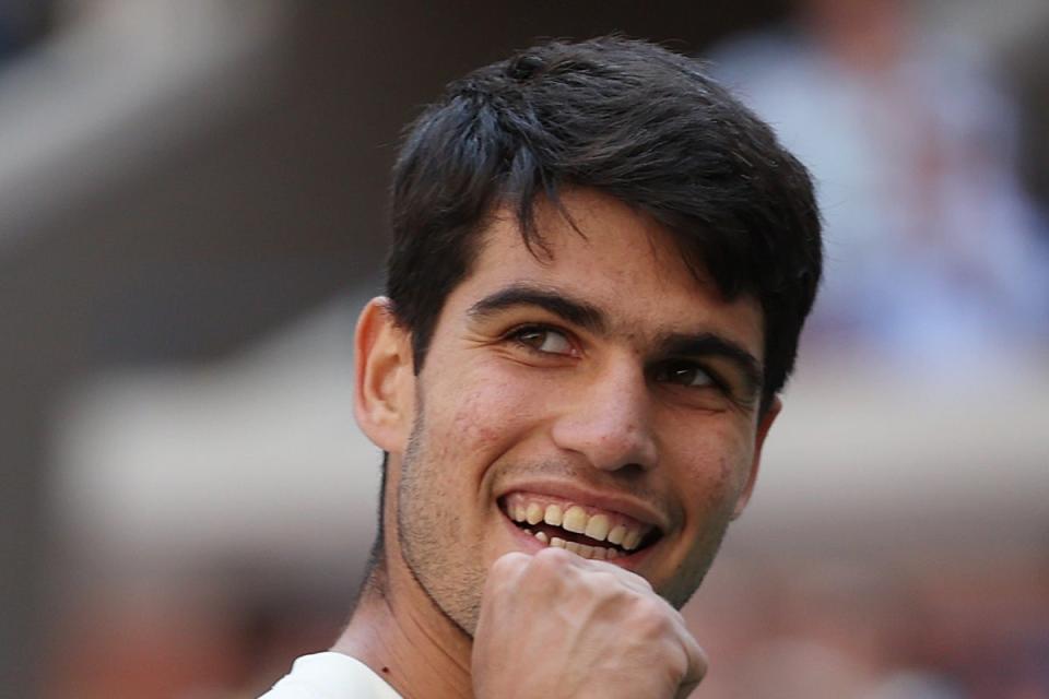 Battling through: Carlos Alcaraz was given a tough test by Dan Evans at the US Open on Saturday  (Getty Images)