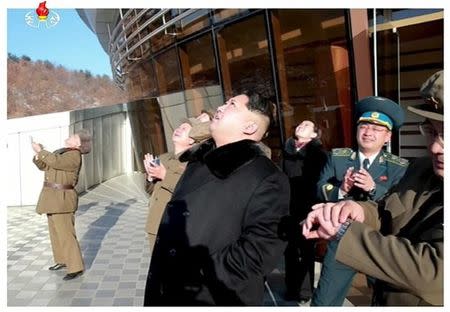 North Korean leader Kim Jong Un watches a long range rocket launched into the air in this still image taken from KRT footage and released by Yonhap on February 7, 2016. REUTERS/Yonhap