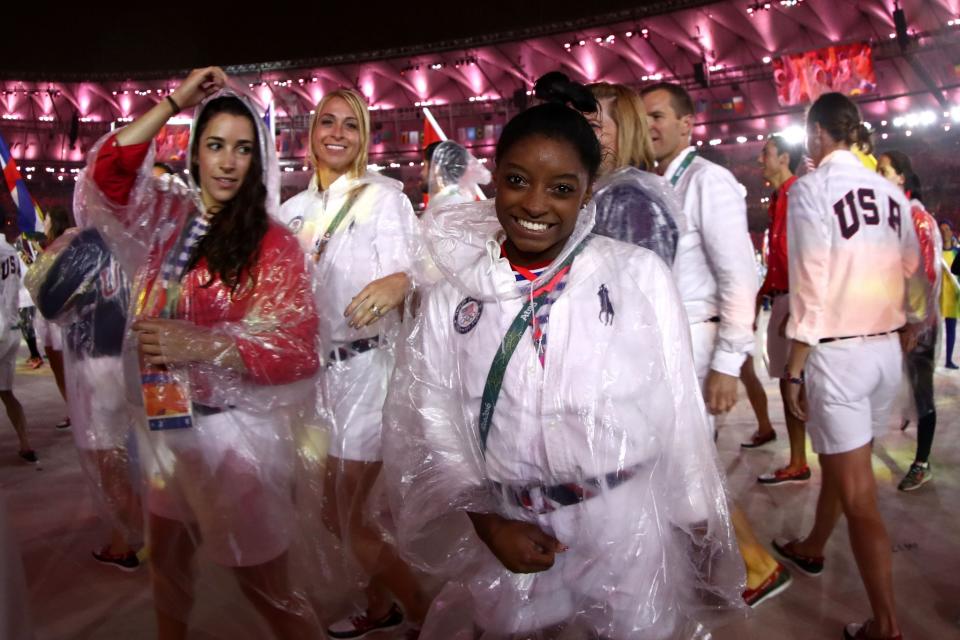 <p>Simone Biles of Team United States walks during the ‘Heroes of the Games’ segment during the Closing Ceremony on Day 16 of the Rio 2016 Olympic Games at Maracana Stadium on August 21, 2016 in Rio de Janeiro, Brazil. (Photo by Ezra Shaw/Getty Images) </p>