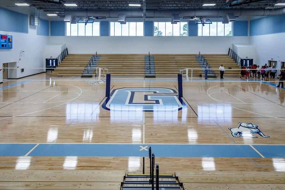 The letter G ("gee") marks the center of the gymnasium floor at Dr. Joaquin Garcia High School in unincorporated Palm Beach County.