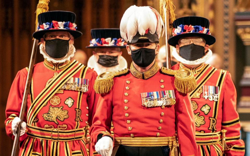 Yeoman warders conduct the traditional ceremonial search in the Palace of Westminster during the start of the State Opening of Parliament - The Times Pool