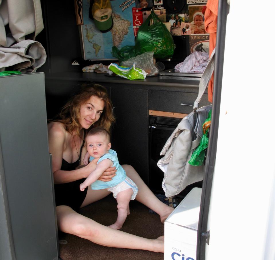 Trujillo with her daughter, Soleil, inside their van in Playa Hermosa, Peru, in 2013. (Photo: Courtesy of Stevie Trujillo)