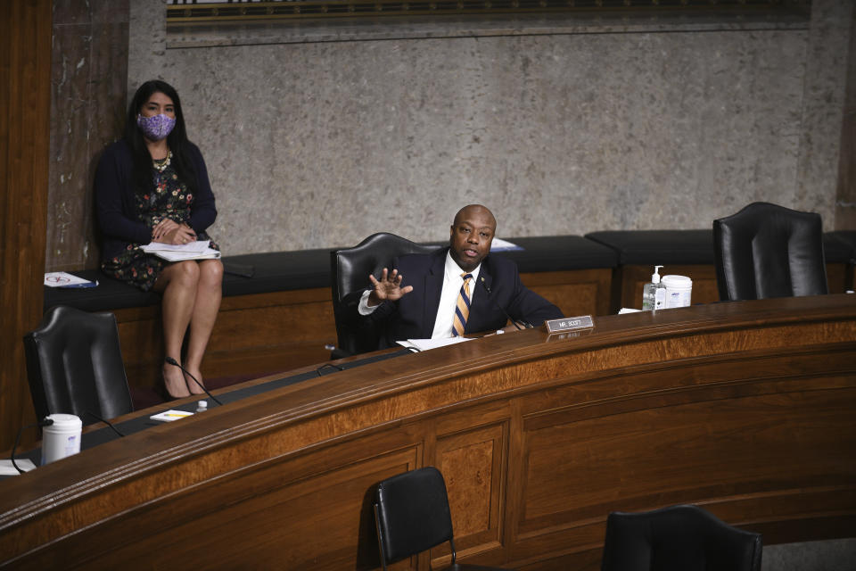 Sen. Timothy Eugene Scott, R-S.C., speaks during a a Senate Banking, Housing, and Urban Affairs Committee hearing on Capitol Hill in Washington, Tuesday, June 9, 2020. (Astrid Riecken/The Washington Post via AP, Pool)