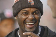 Cleveland Browns quarterback Deshaun Watson laughs while standing on the field before the team's Hall of Fame NFL football preseason game against the New York Jets, Thursday, Aug. 3, 2023, in Canton, Ohio. (AP Photo/David Richard)
