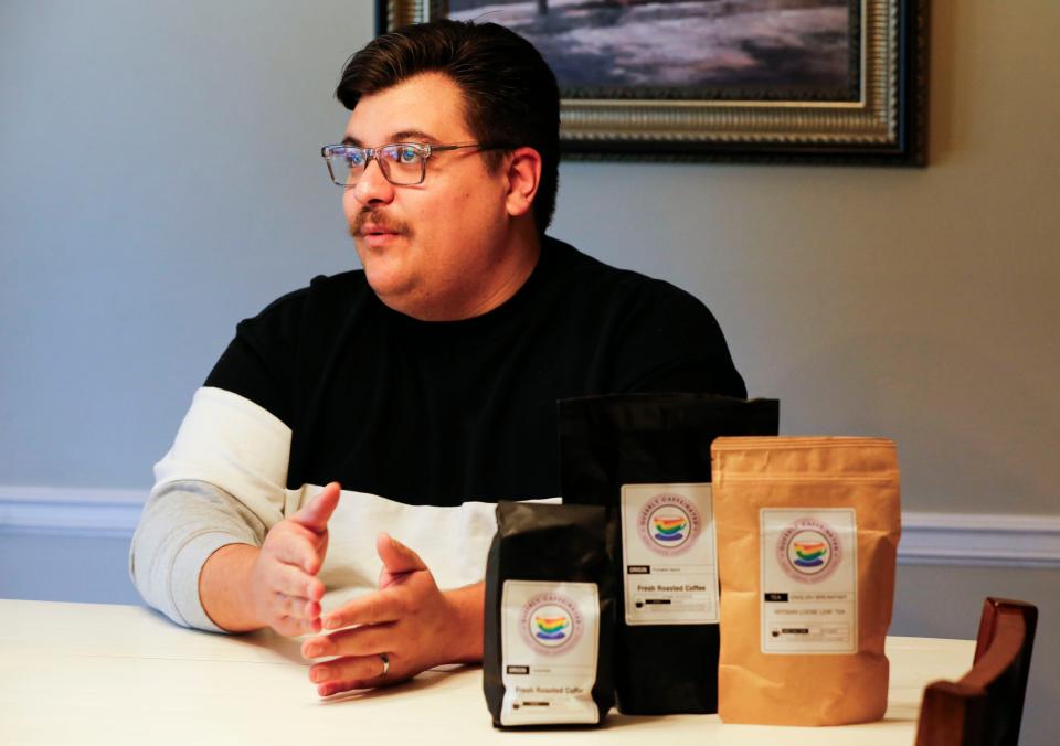 Aaron Schekorra talks about his new coffee brand, Queerly Caffeinated, at his home on Monday, Oct. 30, 2023.