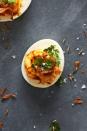 <p>Bite-sized <a href="https://www.delish.com/cooking/recipe-ideas/a51851/classic-deviled-eggs-recipe/" rel="nofollow noopener" target="_blank" data-ylk="slk:deviled eggs;elm:context_link;itc:0;sec:content-canvas" class="link ">deviled eggs</a> get a smoky kick from harissa (Tunisian chili pepper paste) in this simple but flavorful recipe. Topped with crispy fried shallots and fresh cilantro, it may stray pretty far from the original, but it’s just as delicious, and perfect for an afternoon pick-me-up.</p><p>Get the <strong><a href="https://www.delish.com/cooking/recipe-ideas/a40094636/harissa-deviled-eggs-recipe/" rel="nofollow noopener" target="_blank" data-ylk="slk:Harissa Deviled Eggs recipe;elm:context_link;itc:0;sec:content-canvas" class="link ">Harissa Deviled Eggs recipe</a></strong>.</p>