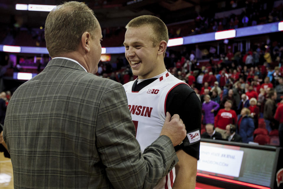 Greg Gard and Brad Davison combined to win Wednesday night’s game for Wisconsin in controversial fashion. (Getty)