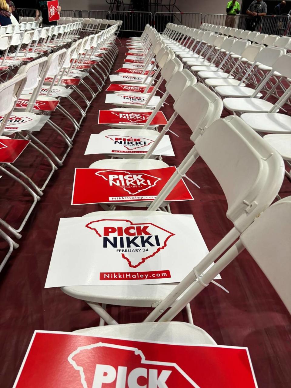 Nikki Haley sings line the chairs in the Williams-Brice Physical Education Center.