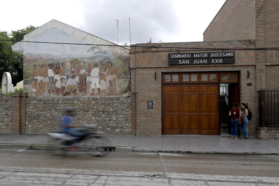 A motorcycle drives past the seminary building in Oran, Argentina, Wednesday, Jan. 16, 2019. Bishop Gustavo Zanchetta "became more aggressive and took impulsive decisions, manipulating facts, people, influences to reach his goals." The Rev. Juan Jose Manzano said he started coming to the seminary at all hours, drinking with the seminarians and bringing a seminarian with him whenever he visited a parish, sometimes without asking permission of the rector. (AP Photo/Natacha Pisarenko)