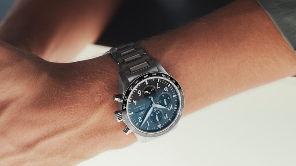F1 driver George Russell models IWC's new Pilot's Watch Performance Chronograph 41.