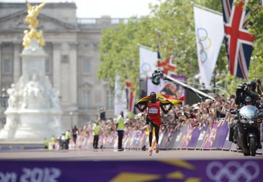 Uganda's Stephen Kiprotich seconds before crossing the finish line to win the Olympic marathon in London on August 12. Kiprotich stunned a strong Kenyan team to win the men's Olympic marathon on Sunday, handing his east African nation only their second ever gold medal