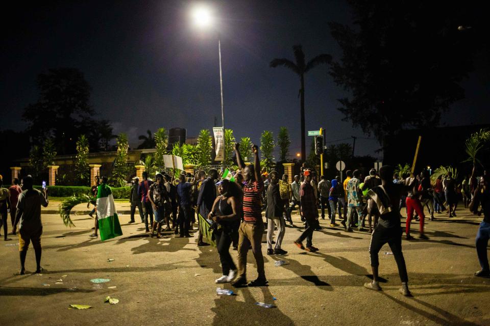 Nigerian protesters in the streets of Alausa Ikeja after the authorities declared an open-ended lockdown in Lagos (Benson Ibeabuchi /AFP via Getty Images)