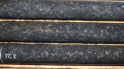 Photo 1: Typical ‘West Graham-style’ mineralization from hole WG-23-026. Core is NQ diameter measuring 47.6 millimetres. Photo is from a depth of 128 metres. (CNW Group/SPC Nickel Corp.)
