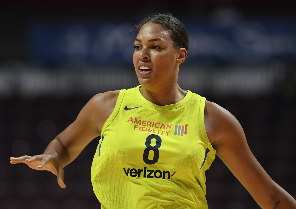 Dallas Wings' Liz Cambage during a preseason WNBA basketball game, Tuesday, May 8, 2018, in Uncasville, Conn. (AP Photo/Jessica Hill)