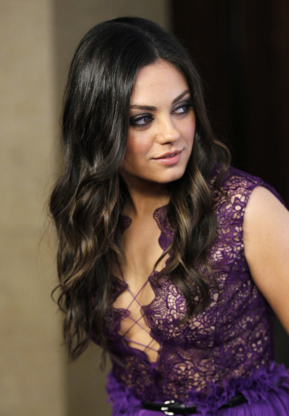 Actress Mila Kunis poses at the benefit gala for the 50th anniversary of St. Jude Children's Research Hospital in Beverly Hills