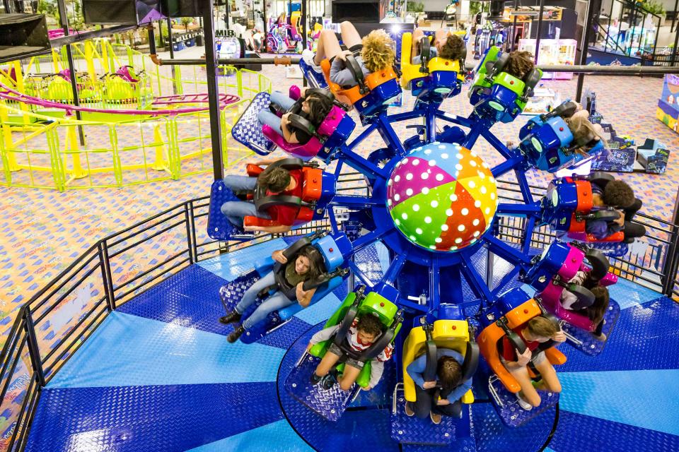 Visitors to Malibu Jack's, an indoor amusement park with a location in Lafayette, Ind., enjoy one of the rides featured in the 116,000-square foot space. Malibu Jack's is located in the Tippecanoe Mall, in the space once occupied by Sears.