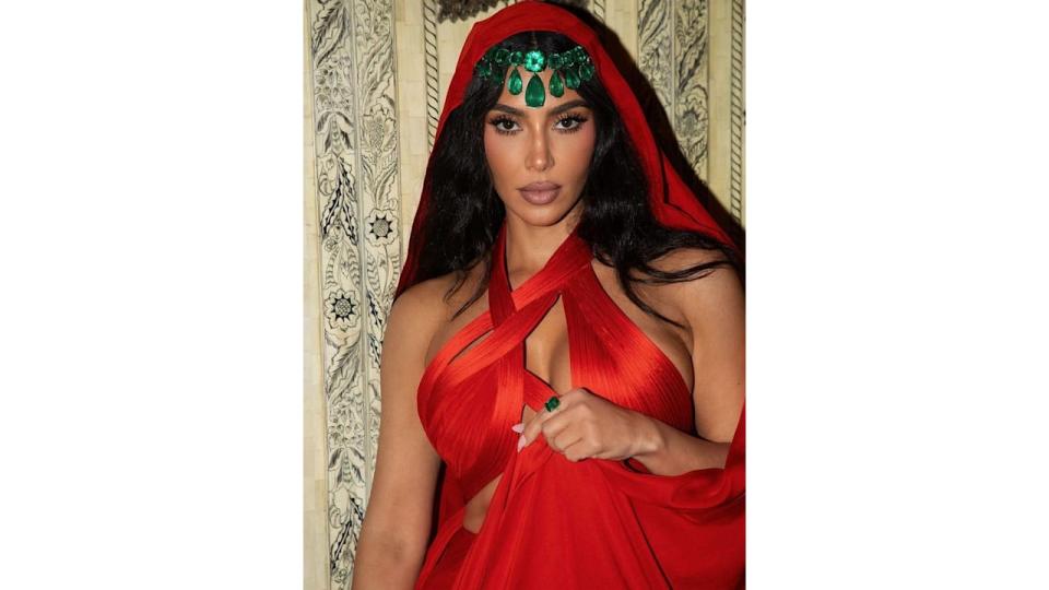 Kim Kardashian wears a red dress to Indian wedding