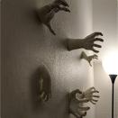 <p><strong>3DDeluxeStore</strong></p><p>etsy.com</p><p><strong>$10.20</strong></p><p>Whether you put these creepy reaching hands—which come with command strips for mounting—on your walls or windows, there's no doubt they'll enhance any eerie ambiance.</p>