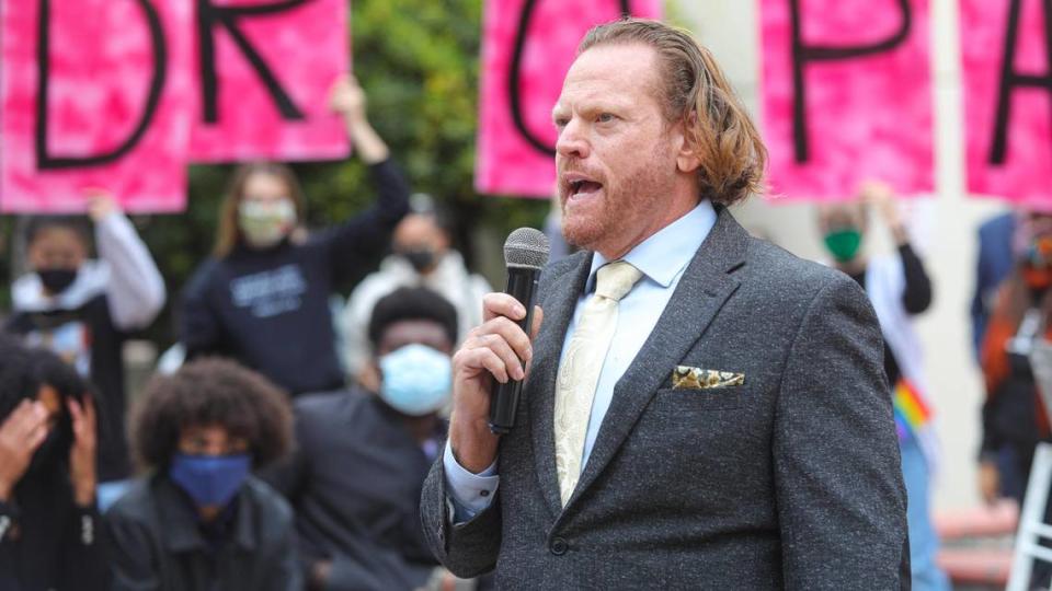 Curtis Briggs, one of Tianna Arata’s attorneys, speaks to supporters during a rally on Thursday, Oct. 22, 2020, outside the San Luis Obispo County Courthouse. They were there to protest the court hearing for organizer Tianna Arata and others facing misdemeanor charges over a July 21 protest in San Luis Obispo.